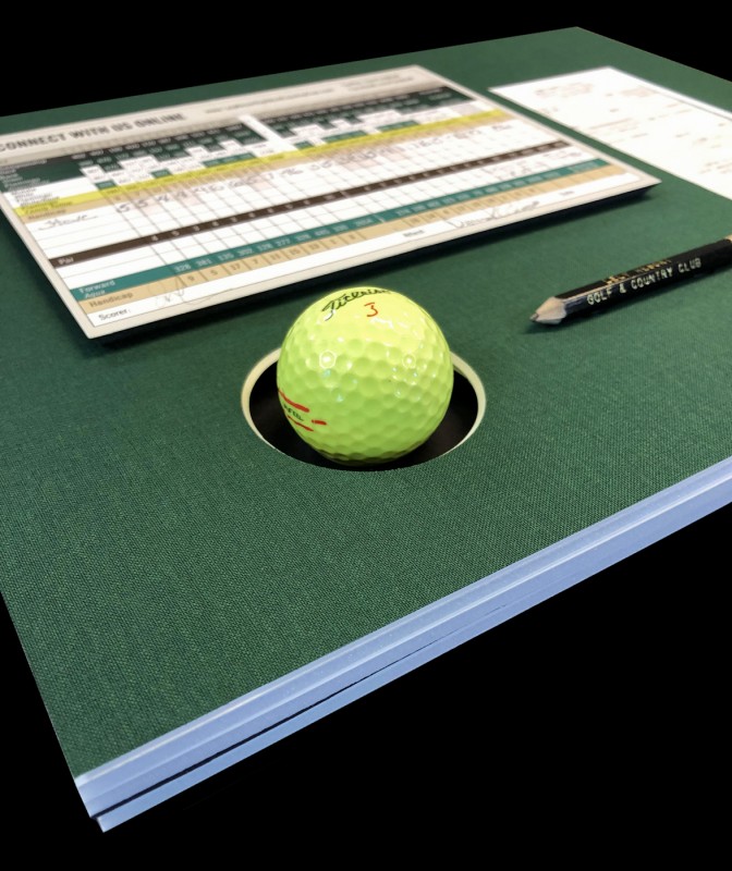 Detail of golf ball in mat board